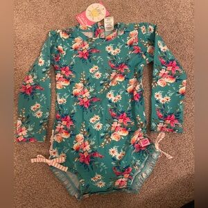 Ruffle butts long sleeve bathing suit.